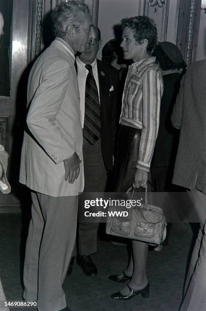 Inge Morath attend the first performance of Arthur Miller's play 'The Creation of the World and Other Business' at the Colonial Theatre in Boston,...