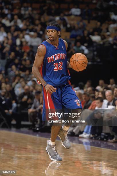 Guard Richard Hamilton of the Detroit Pistons dribbles the ball during the preseason NBA game against the Toronto Raptors on October 8, 2002 at the...