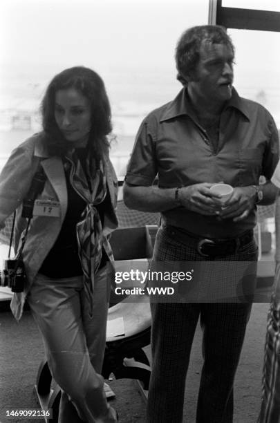 Ina Balin and John Stephens attend the California 500 Race at the Ontario Speedway in Ontario, California, on September 2, 1972.
