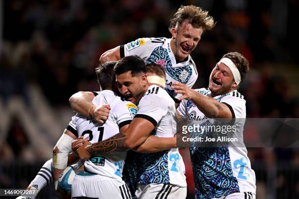 Cortez Ratima of the Chiefs celebrates with his team after scoring a try during the round one Super Rugby Pacific match between Crusaders and Chiefs...