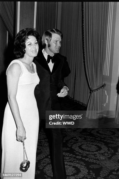 Billie Jean Nunley and Glen Campbell attend a March of Dimes event celebrating Frank Sinatra as 'Man of the Year' at the Beverly Hilton Hotel in...