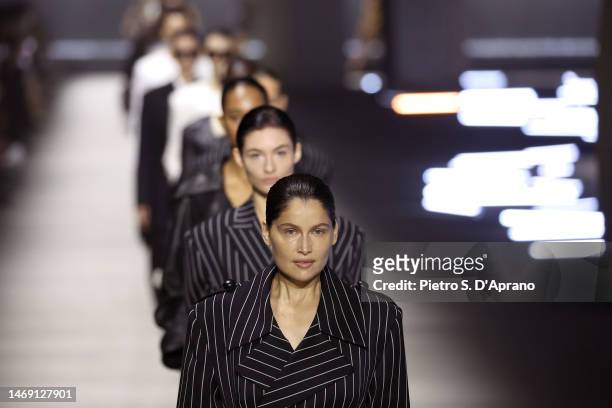 Laetitia Casta and model walk the runway at the Tod's fashion show during the Milan Fashion Week Womenswear Fall/Winter 2023/2024 on February 24,...