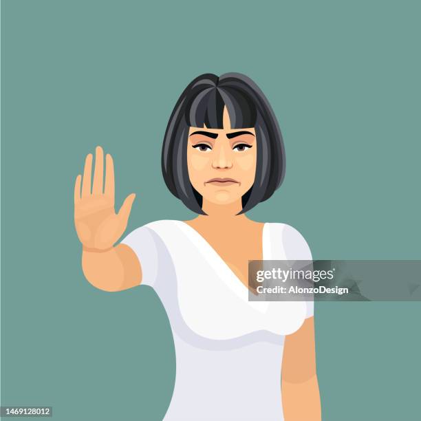 ernsthafte junge frau, die stopp-geste zeigt. - hand geste halt stock-grafiken, -clipart, -cartoons und -symbole