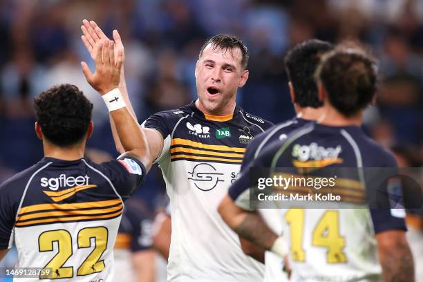 Nick Frost of the Brumbies celebrates victory with his team mates during the round one Super Rugby Pacific match between NSW Waratahs and ACT...