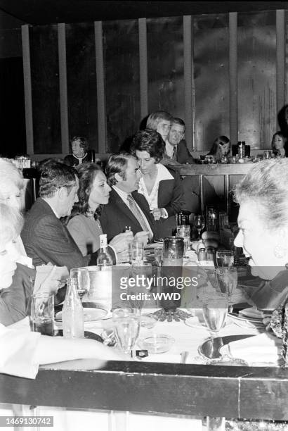 Veronique Peck and Gregory Peck attend Nancy Sinatra's opening night at the Ambassador Hotel in Los Angeles on June 8, 1972.