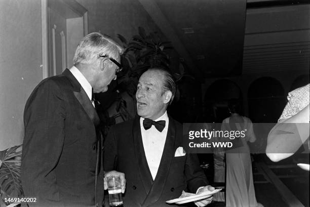 Cary Grant and Bruno Pagliai attend a party for the movie 'Interval' in Mexico City on the weekend of March 3-4, 1973.