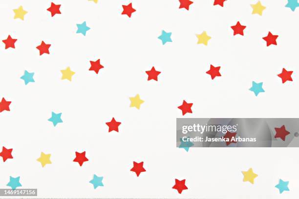 colorful star confetti on the white background - star confetti white background stockfoto's en -beelden