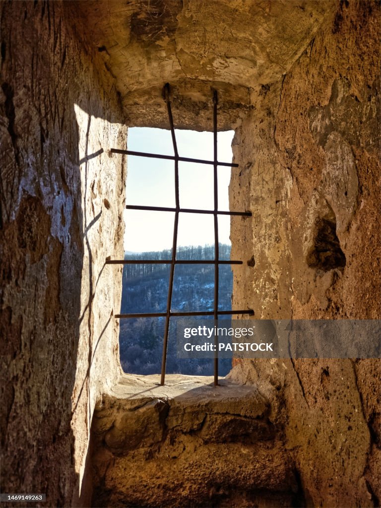 Barred window in the castle tower