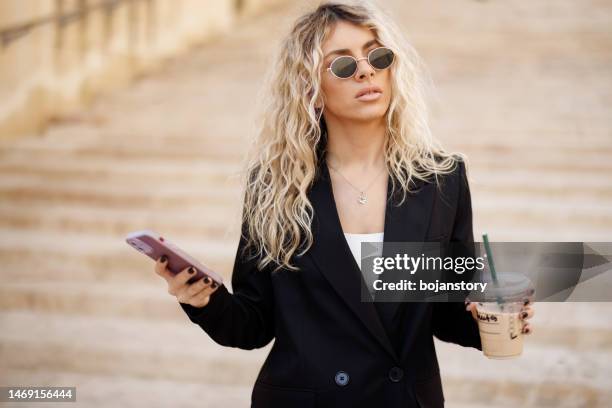 commuting to work - black suit sunglasses stock pictures, royalty-free photos & images