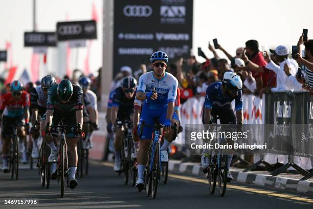 Dylan Groenewegen of The Netherlands and Team Jayco Alula celebrates at finish line as stage winner ahead of Fernando Gaviria Rendon of Colombia and...