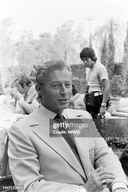 Lex Barker attends a party for the movie 'Interval' in Mexico City on the weekend of March 3-4, 1973.