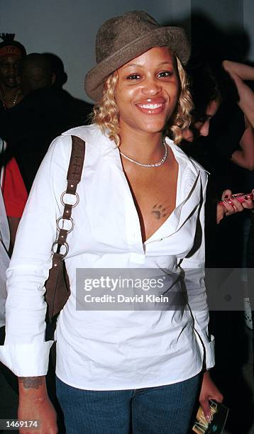 Rapper Eve poses outside The Pharmacy club October 7, 2002 in Hollywood, California.