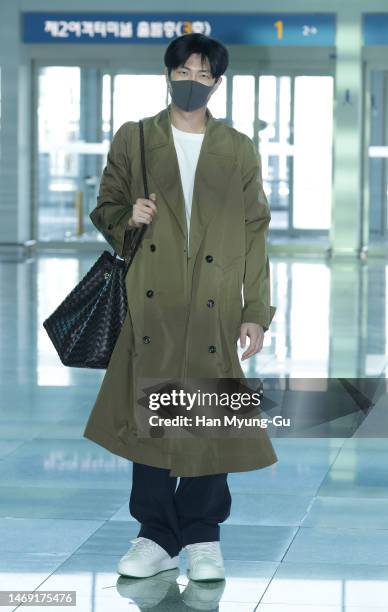 Of boy band BTS is seen on departure at Incheon International Airport on February 24, 2023 in Incheon, South Korea.