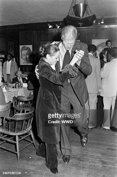 Louise Sorel dances with Ken Howard during a farewell party for outgoing New York City Mayor John Lindsay at Gallagher's in Manhattan on December 26,...