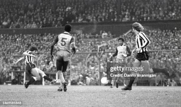 Newcastle striker Peter Beardsley cool as you like slots home his first goal of a hat trick as Sunderland players Gary Bennett and Howard Gayle look...