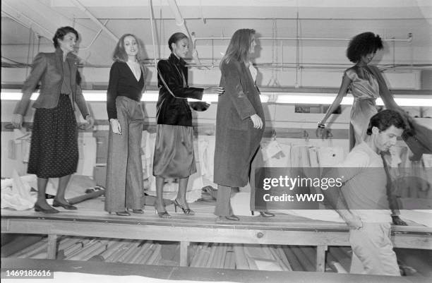 Designer Calvin Klein and models Janice Dickinson, Beverly Johnson, Alva Chinn and Patti Hansen