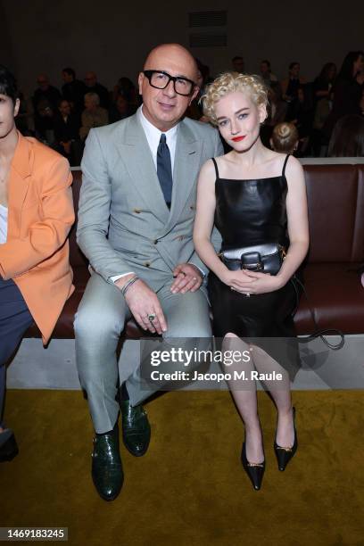 Marco Bizzarri and Julia Garner are seen at the Gucci show during Milan Fashion Week Fall/Winter 2023/24 on February 24, 2023 in Milan, Italy.