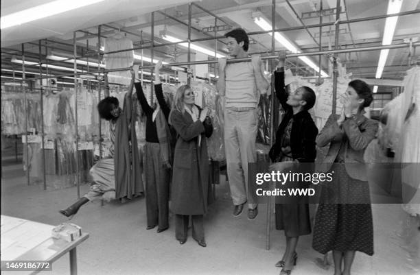 Designer Calvin Klein and models Janice Dickinson, Beverly Johnson, Alva Chinn and Patti Hansen