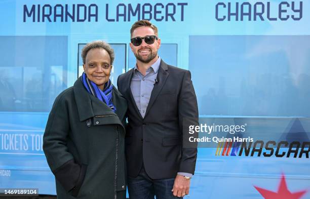 Cup Series driver, Ricky Stenhouse Jr., winner of the 65th Annual Daytona 500 and Chicago Mayor Lori Lightfoot pose for photos on February 21, 2023...