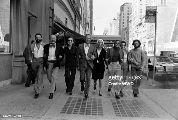 Designers Don Kline, Lee Bailey, Viola Sylbert, Dick Huebner, Ralph Lauren, Holly Harp, and Carlos Falchi and Bendel's president Geraldine Stutz pose...