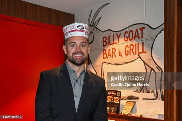 Cup Series driver, Ricky Stenhouse Jr., winner of the 65th Annual Daytona 500 poses for photos at the Billy Goat Tavern on February 21, 2023 in...