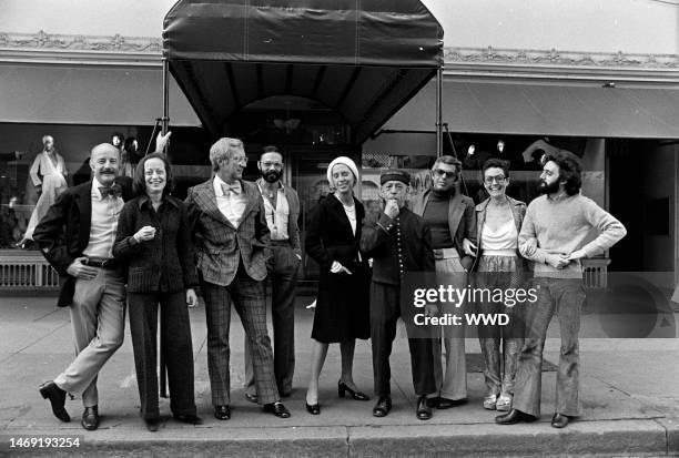 Designers Don Kline, Lee Bailey, Viola Sylbert, Dick Huebner, Ralph Lauren, Holly Harp, and Carlos Falchi and Bendel's president Geraldine Stutz pose...