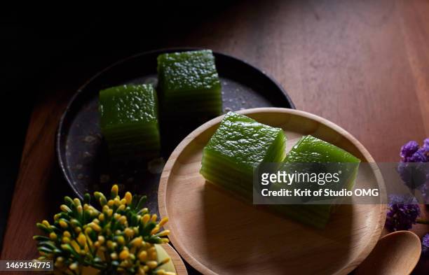 the steamed layers dessert, a traditional thai dessert - coconut chunks stock pictures, royalty-free photos & images