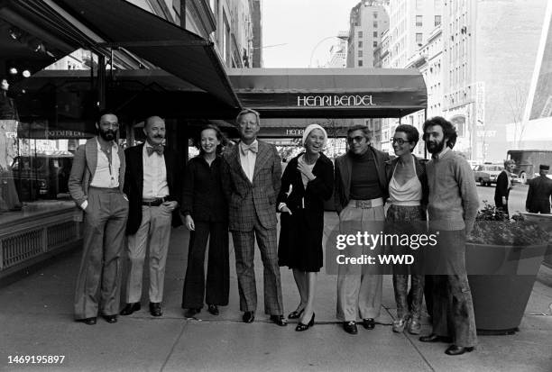 Designers Don Kline, Lee Bailey, Viola Sylbert, Dick Huebner, Ralph Lauren, Holly Harp, and Carlos Falchi and Bendel's president Geraldine Stutz pose...