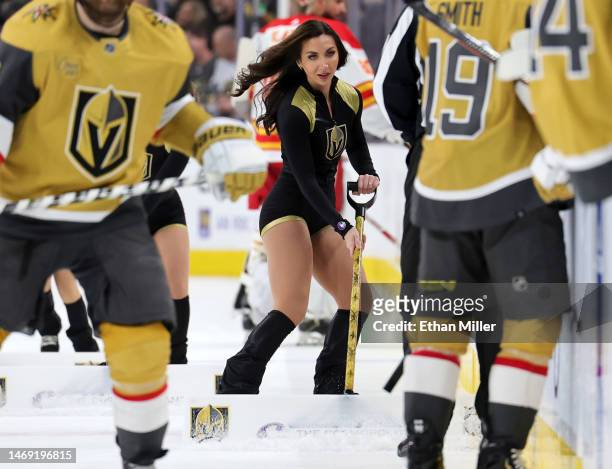 Member of the Knights Guard cleans the ice during the Vegas Golden Knights' game against the Calgary Flames at T-Mobile Arena on February 23, 2023 in...