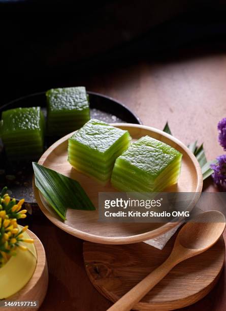 the steamed layers dessert, a traditional thai dessert - coconut chunks stock pictures, royalty-free photos & images