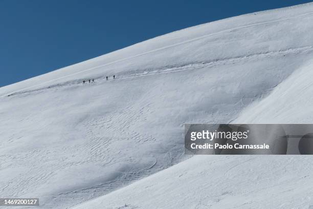trekkers  hiking on a mountain snow covered - monte terminillo bildbanksfoton och bilder