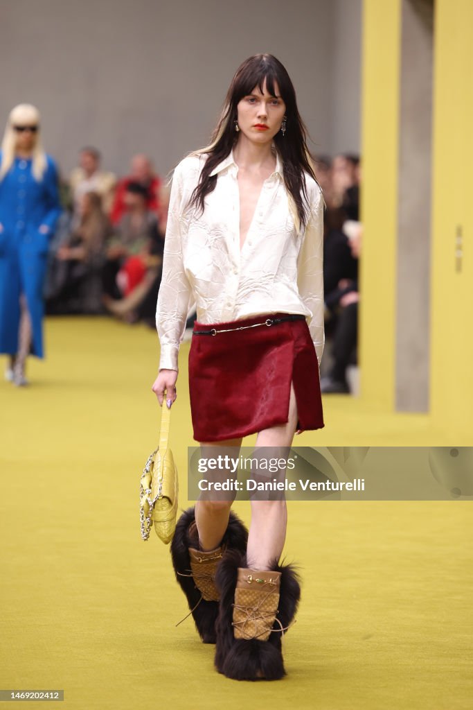 a-model-walks-the-runway-at-the-gucci-show-during-milan-fashion-week-fall-winter-2023-24-on.jpg