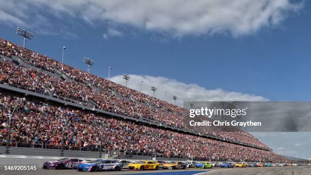 Kyle Larson, driver of the HendrickCars.com Chevrolet, and Alex Bowman, driver of the Ally Chevrolet, lead the field to start the NASCAR Cup Series...