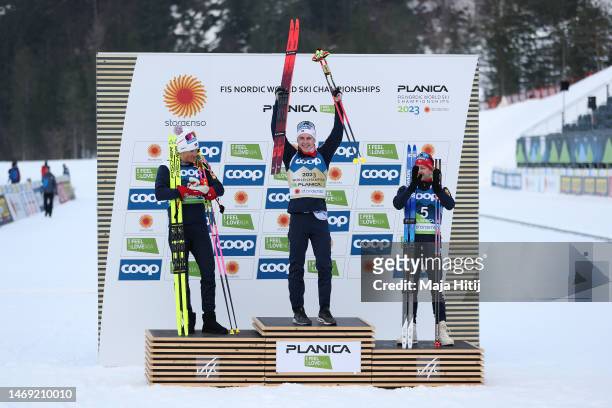 Silver medalist, Johannes Hoesflot Klaebo of Norway, gold medalist, Simen Hegstad Krueger of Norway and bronze medalist, Sjur Roethe of Norway...
