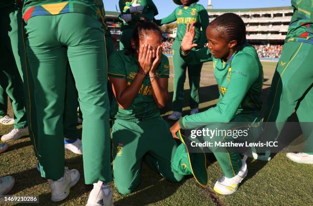 Shabnim Ismail and Ayabonga Khaka of South Africa celebrate following the ICC Women's T20 World Cup Semi Final match between England and South Africa...