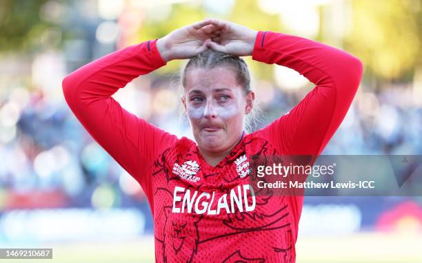 Sophie Ecclestone of England cuts a dejected figure following the ICC Women's T20 World Cup Semi Final match between England and South Africa at...