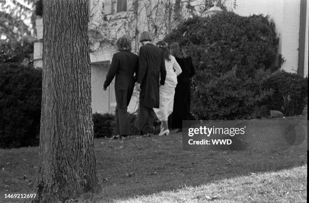 Joseph P. Kennedy Jr., David Lee Townsend, Kathleen Kennedy, and guest attend a reception in McLean, Virginia, following Kathleen and Townsend's...