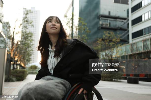 Young Asian Woman in a Wheelchair