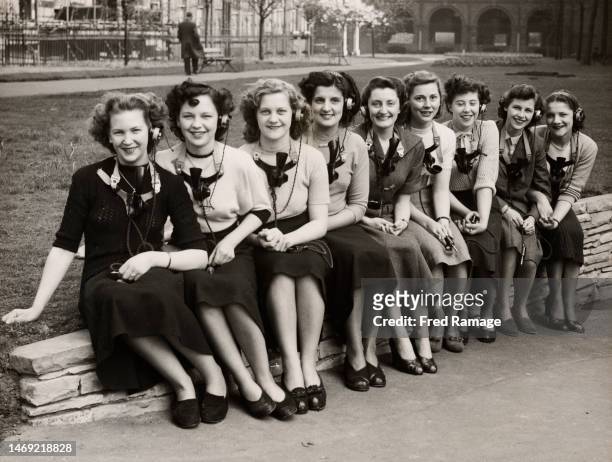 Telephonists competing in the Miss Mayfair finals, Betty Topham of Putney, Sylvia Jenkins of Finsbury Park, Doris Worrall of Holland Park, June...