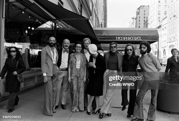 Designers Don Kline, Lee Bailey, Viola Sylbert, Dick Huebner, Ralph Lauren, Holly Harp, and Carlos Falchi and Bendel's president Geraldine Stutz pose...