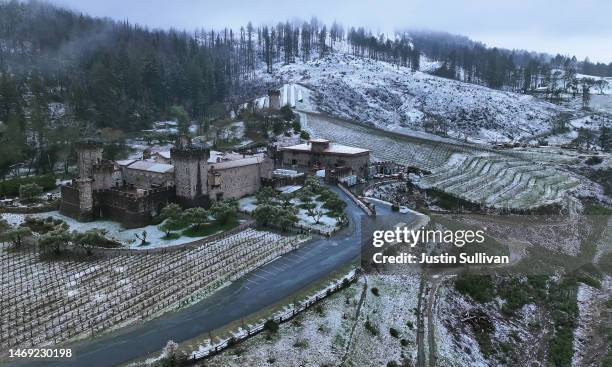 In an aerial view, a dusting of snow covers the property at the Castello di Amorosa Winery on February 24, 2023 in Calistoga, California. A large...