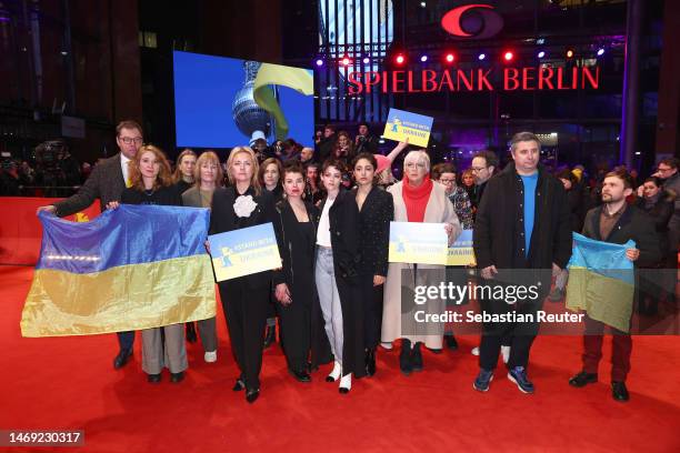 Claudia Roth, International Jury members Golshifteh Farahani, Kristen Stewart, Ukrainian filmmakers and further members of the film community pose in...