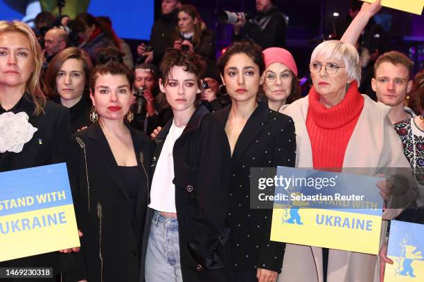 Claudia Roth, International Jury members Golshifteh Farahani, Kristen Stewart, Ukrainian filmmakers and further members of the film community pose in...