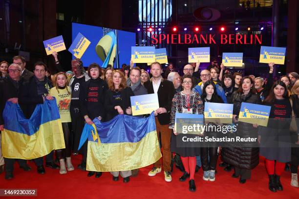 Ukrainian filmmakers and further members of the film community pose in a Demonstration of Solidarity with Ukraine ahead of the "Bis ans Ende der...