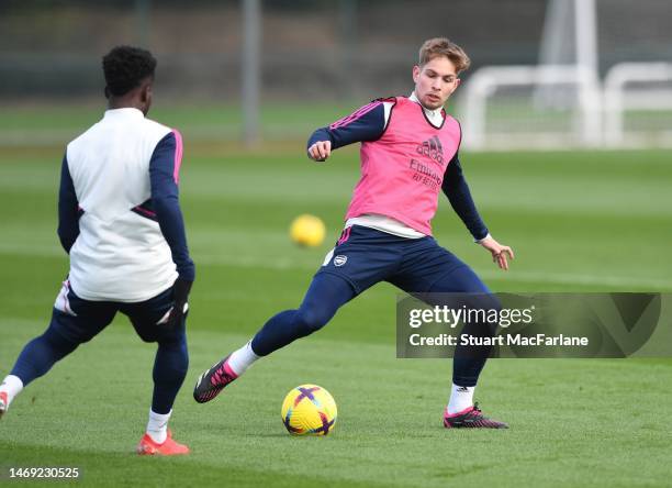 Bukayo Saka and Emile Smith Rowe of Arsenal during a training session at London Colney on February 24, 2023 in St Albans, England.