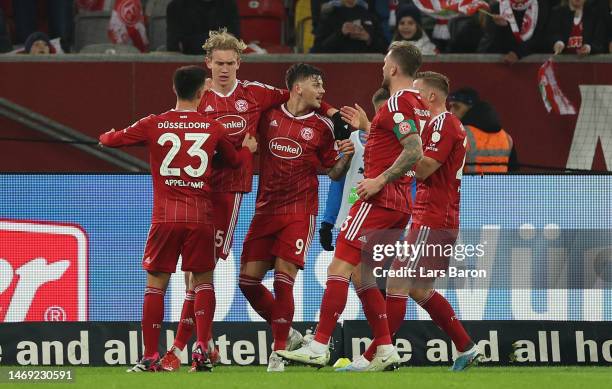 Christoph Klarer of Duesseldorf celebrates with team mates after scoring his teams second goal during the Second Bundesliga match between Fortuna...