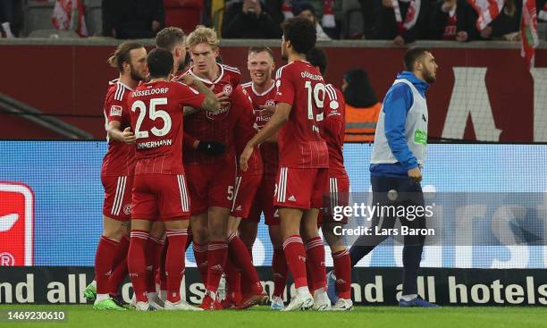 Christoph Klarer of Duesseldorf celebrates with team mates after scoring his teams second goal during the Second Bundesliga match between Fortuna...