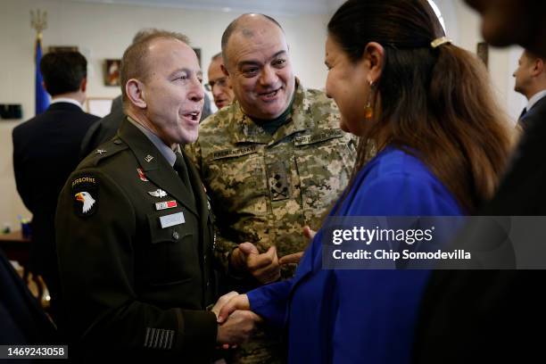 Army Brigadier General Frank Stanco is introduced to Ukrainian Ambassador to the United States Oksana Markarova by Armed Forces of Ukraine Major...