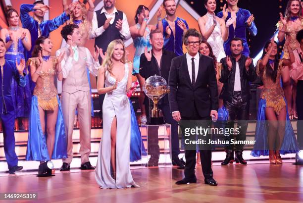 Hosts Victoria Swarovski and Daniel Hartwich on stage with contestants during the first "Let's Dance" show at MMC Studios on February 24, 2023 in...