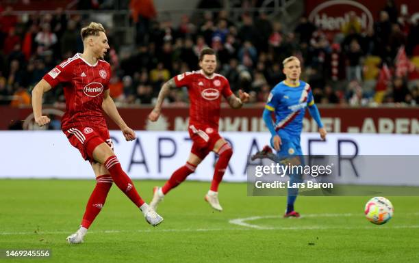 Jona Niemiec of Duesseldorf scores his teams third goal during the Second Bundesliga match between Fortuna Düsseldorf and Eintracht Braunschweig at...